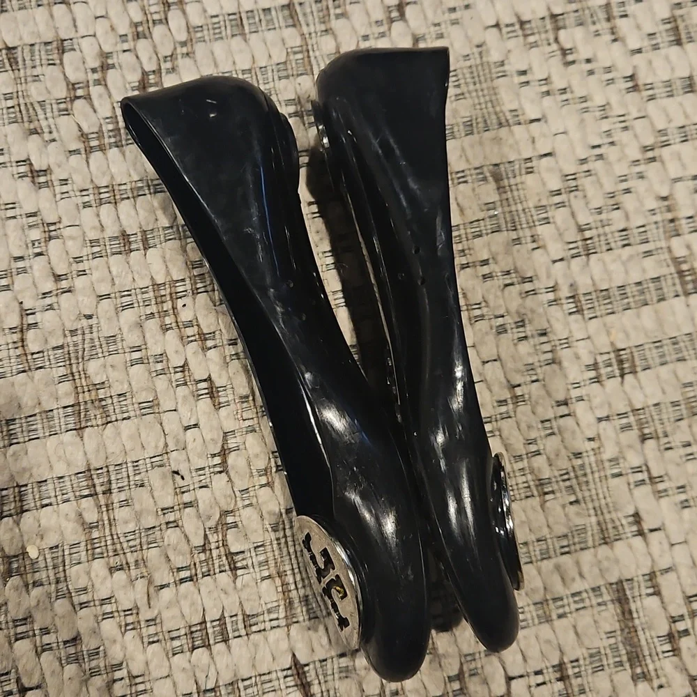 TORY BURCH Black Jelly Ballet Flats with Silver Logo.